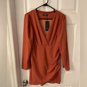Sheilay dress. Never worn. Large. Burnt orange